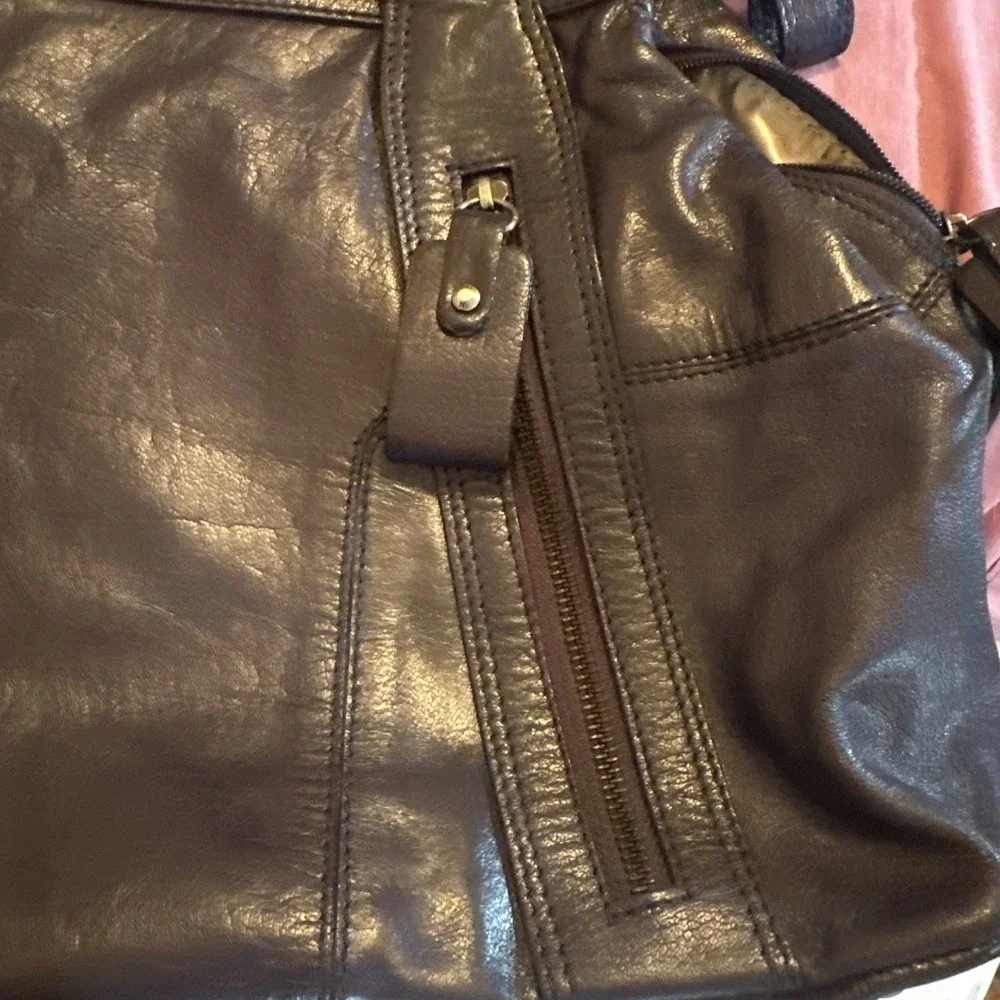 Nicoli Italian leather Large satchel features a dark purplish Blue finish